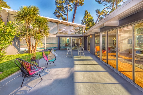 Exterior of a contemporary home with patio, typical of the town of Cabin John