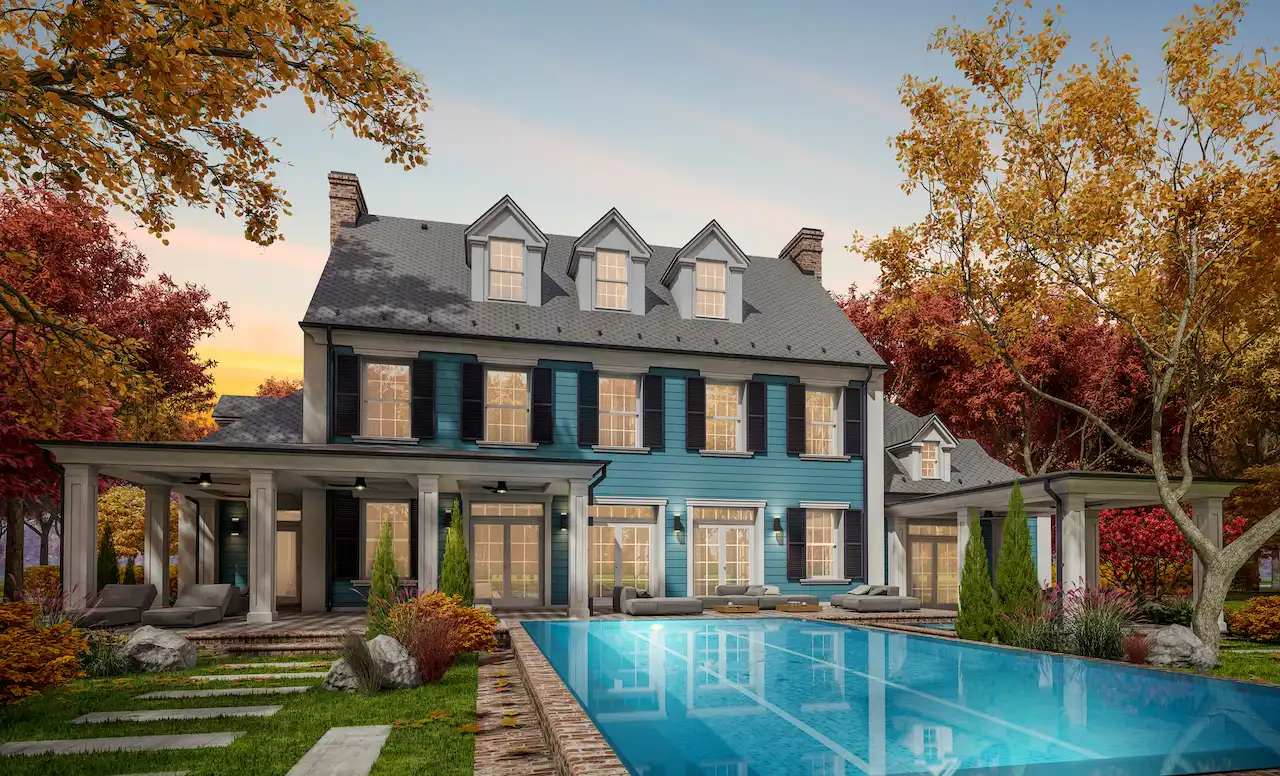 Sunny exterior view of beautiful home with swimming pool