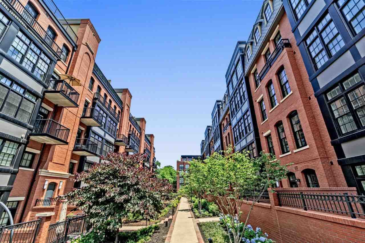 Sunny view of contemporary style condominium complex in Gaslight Square, Arlington, VA